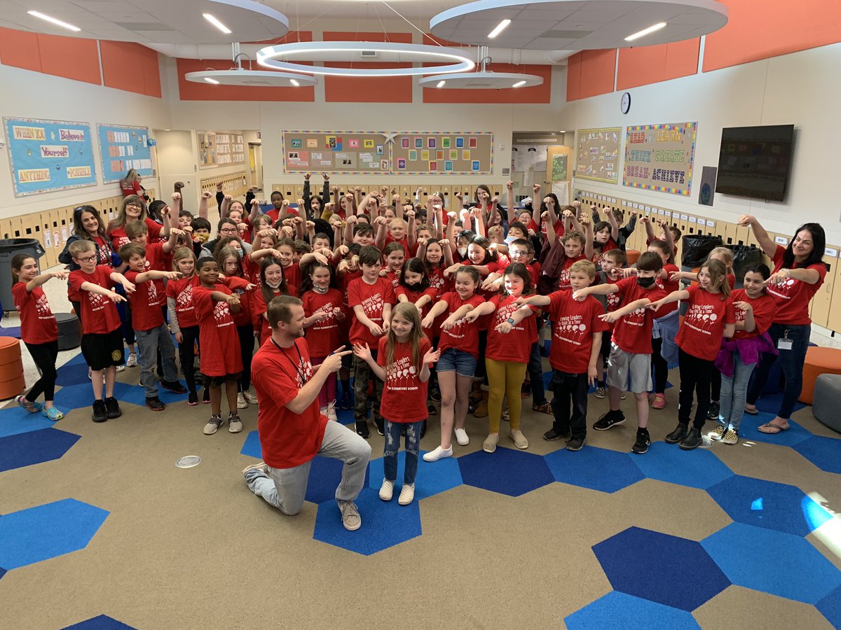 sgodshalk's tweet photo. Everyone at Neidig wore our new leadership shirts today. Here is a picture of our 4th graders celebrating Taylor for her winning t-shirt design!  #qcsd #neidig #lim https://t.co/Jj8aFphBW9
