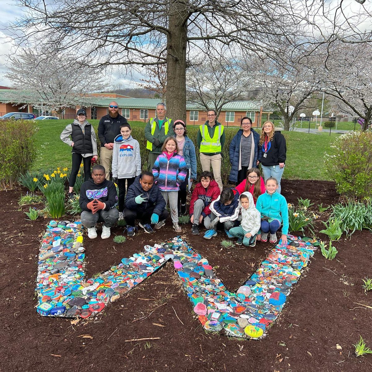 Our Art teachers, some 5th graders, their parents, some PTA parents, with a kind donation from Ruppert Landscaping, beautified our W out front. The rocks were painted by Whittier students under the guidance of Mrs. Stiegler and Ms. Pope. Thanks for your service to the community.
