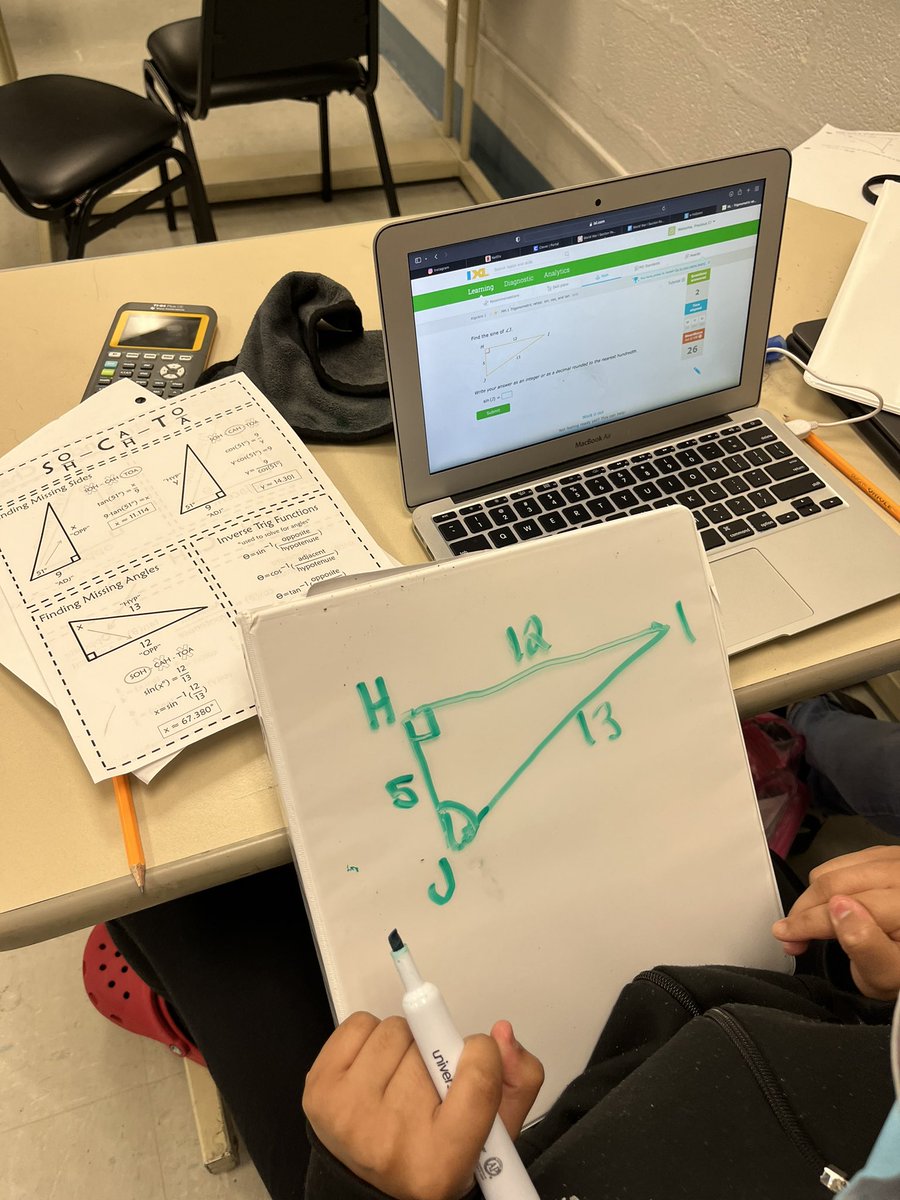 mathsmith314's tweet photo. One of my freshman geometry student’s turned her binder into a dry erase board. She even has her reference angle marked. #iteachmath #ixlmath #ti84 #Trigonometry #sohcahtoa https://t.co/J9SNqfIcHI