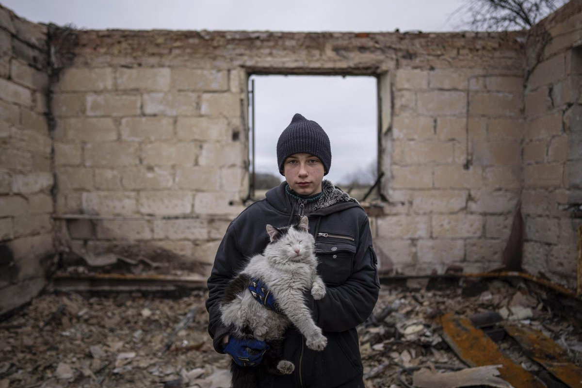 Danyk Rak, 12, is standing on the debris of his house outside Chernihiv. Danyk's mother was injured in her abdomen and had to have her leg amputated. She is still waiting for proper medical treatment. #StopRussia

Photo: AP Photo/<a href="/EMaloletka/">Evgeniy Maloletka</a>