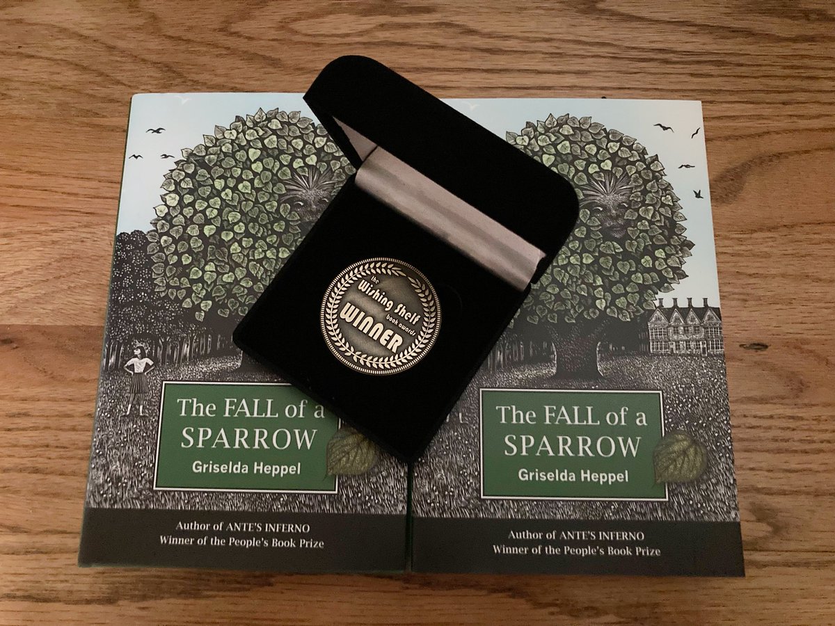 GriseldaHeppel's tweet photo. Look what just arrived! 😀 Thrilled to receive my ⁦@WishingShelf⁩ WINNER’s medal for #TheFallofaSparrow #wishingshelfindependentbookawards https://t.co/WqEPmL2S4n