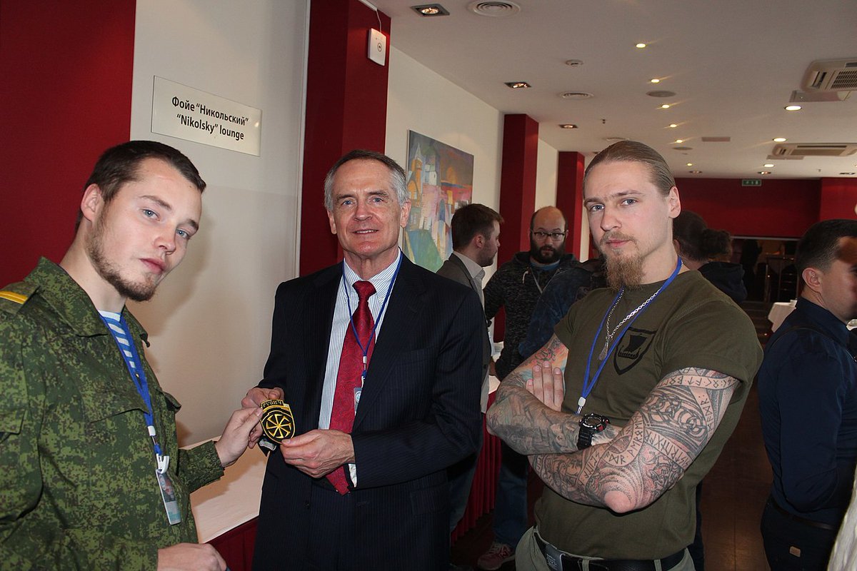 Alexey and Yan Petrovsky (right) with the white supremacist Jared Taylor (centre). (7/24)
