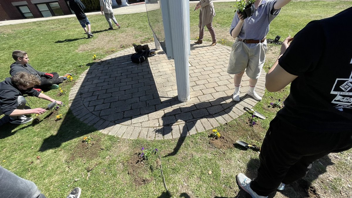 HopedaleGSA's tweet photo. Members of the GSA planted flowers outside the school on Monday to celebrate Earth Day early! https://t.co/9lEcCagaZQ