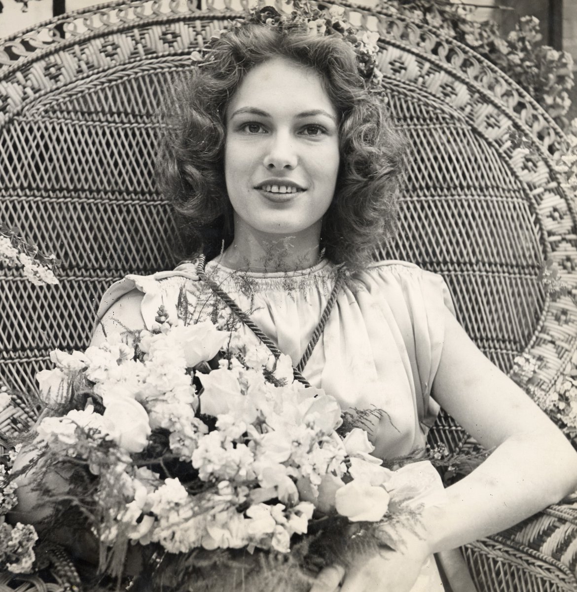 HowardColmanLib's tweet photo. Happy #ThrowbackThursday! Check out this photograph of the 1942 May Day Queen, Ruth Hueter. Each year the new May Day Queen was crowned with violets while the previous year's queen received a crown of forget-me-nots. https://t.co/xaLYw69dWq