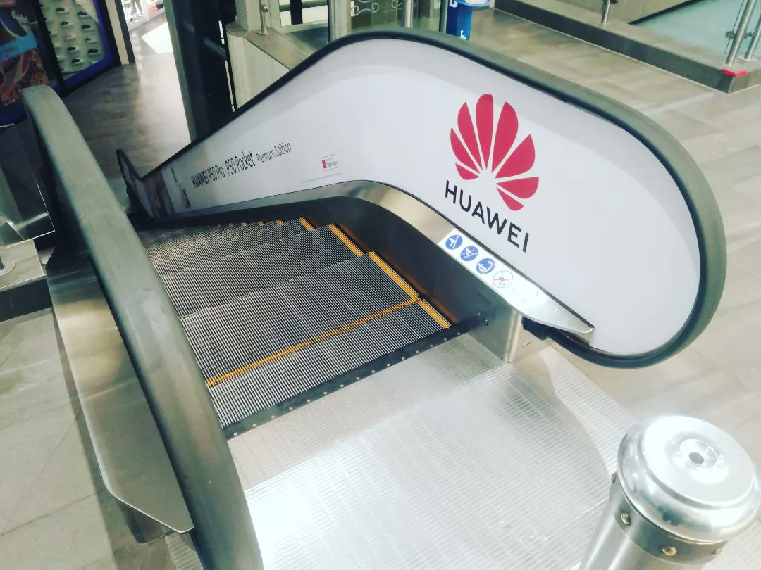 WrappersZA's tweet photo. Escalator branding #nova #huawei #p50 #lakesidemall https://t.co/ppp9CqDx7Q