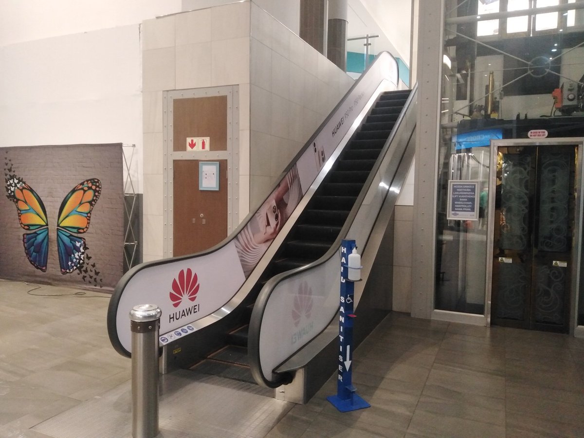 WrappersZA's tweet photo. Escalator branding #nova #huawei #p50 #lakesidemall https://t.co/ppp9CqDx7Q