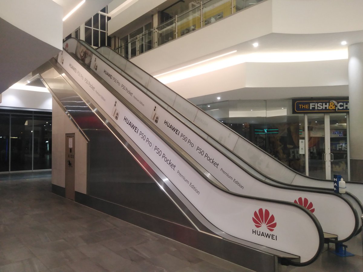 WrappersZA's tweet photo. Escalator branding #nova #huawei #p50 #lakesidemall https://t.co/ppp9CqDx7Q