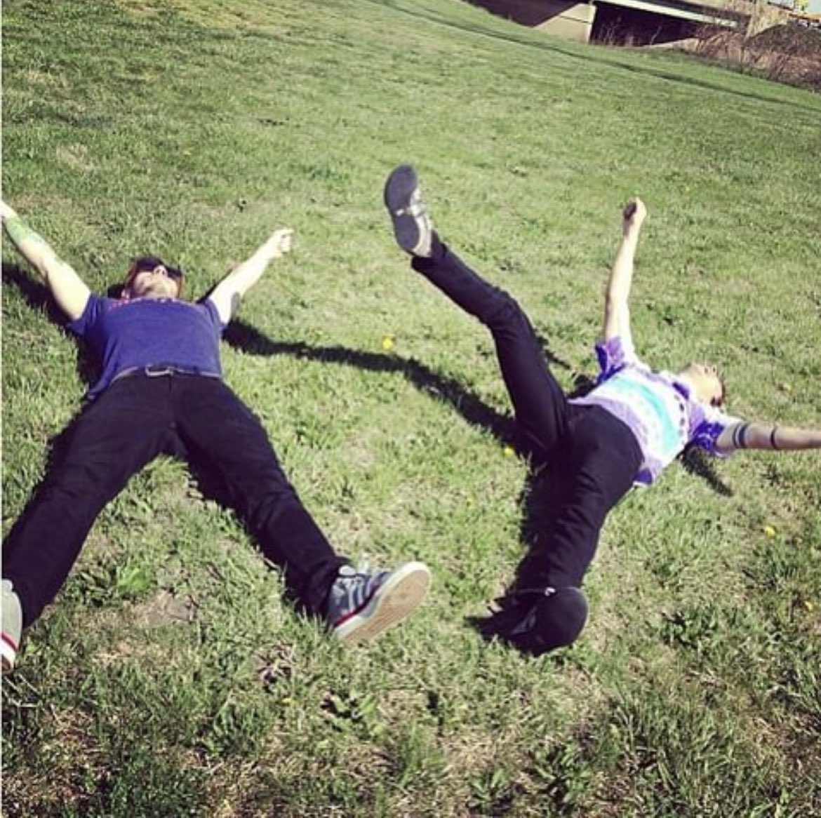 tyler joseph and josh dun via <a href="/twentyonepilots/">twenty one pilots</a>’s instagram nine years ago “enjoying grass and sun. (photo by our tech @/slowjohn)”