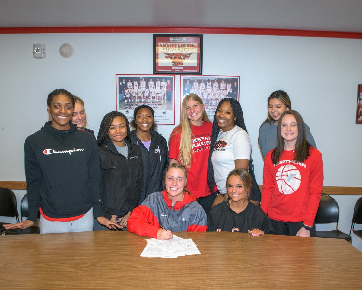 noc_mavs's tweet photo. A few probably embarrassing pics from yesterday, as Shelby Rayner signs with Northwestern State University in Natchitoches, Louisiana. The NCAA D1 university just got better congrats to them and Shelby.  Also a MASSIVE shout out to the Hook family, we so appreciate them. https://t.co/hb1Wdvknzy