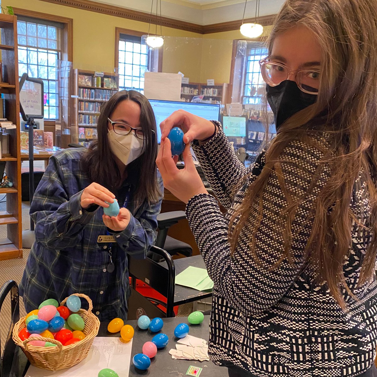 ConcordLibrary's tweet photo. Samantha and Madeline couldn’t resist! We’ve hidden eggs throughout #FowlerBranch - stop by and see what you can find! Or come by Saturday at 11 am for #SaturdayStudio and more opportunities to hunt eggs! #MyCFPL #WhereIdeasDevelop https://t.co/tIPyDeX8Yy