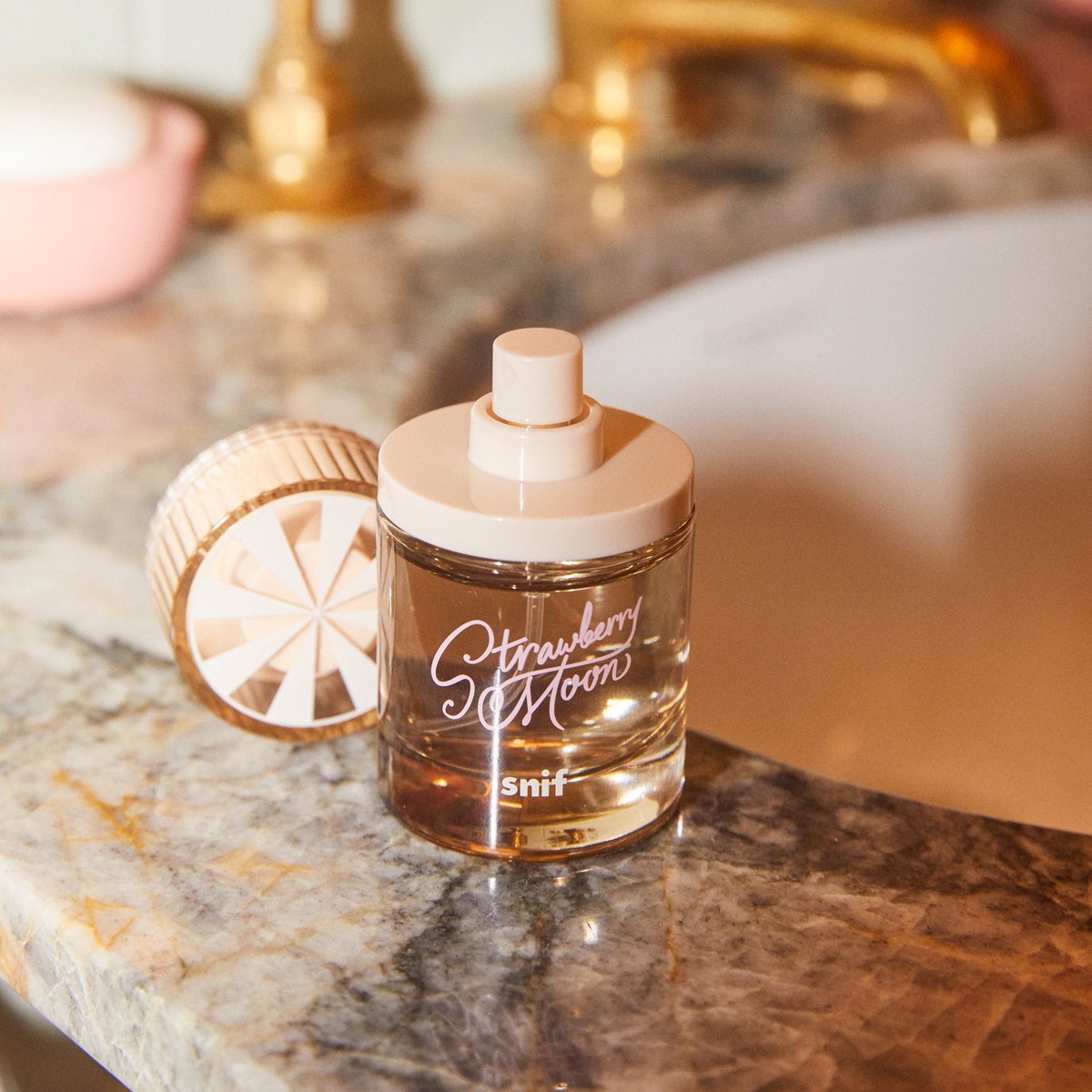Our twice sold-out scent, Strawberry Moon, is back in stock! Grab the scent of the summer before it takes off for vacation ✈️ snif.co