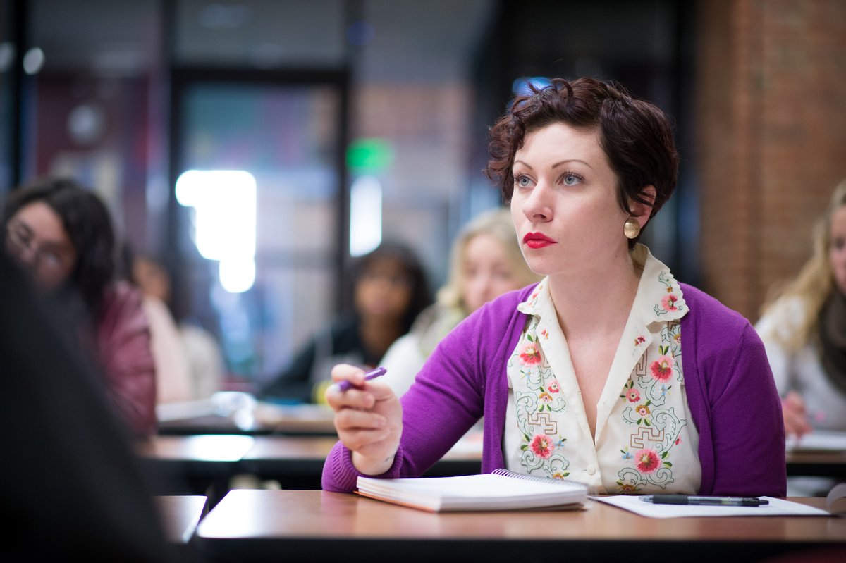 A student taking notes.