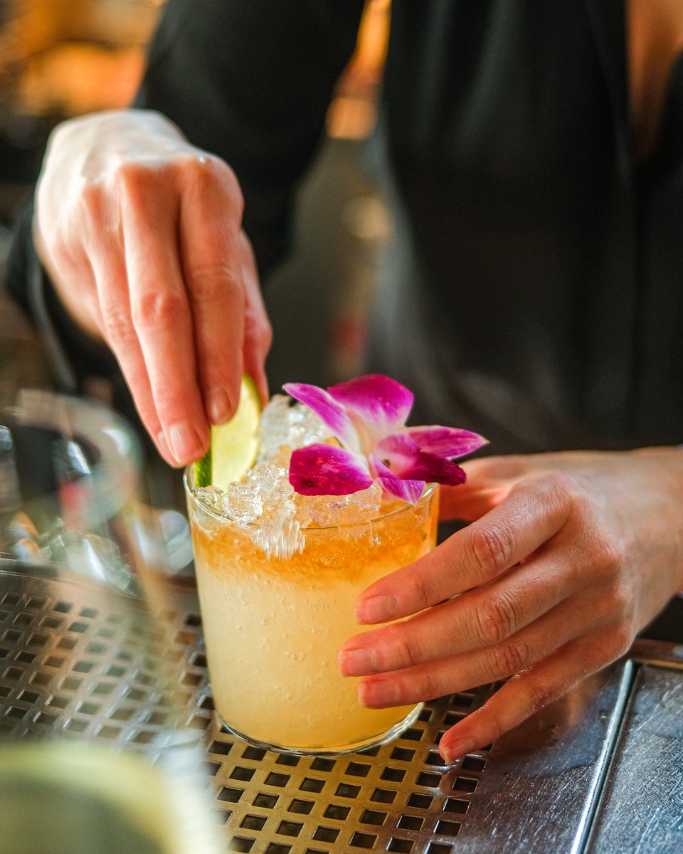 Putting the finishing touch on our Mai Tai Crush is like putting your sun hat on before stepping out onto hot sandy beach. Just one sip will take you on a tropical trip, in time for the long weekend. #JOEYRestaurants #cocktails #maitai #tikicocktails #newcocktail