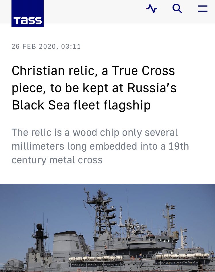 A screenshot of a news article from TASS, the Russian state news agency, saying “Christian relic, a True Cross piece, to be kept at Russia’s Black Sea fleet flagship. The relic is a wood chip only several millimeters long embedded into a 19th century metal cross.” Included is a photo of the missile cruiser Moskva, now sunken.