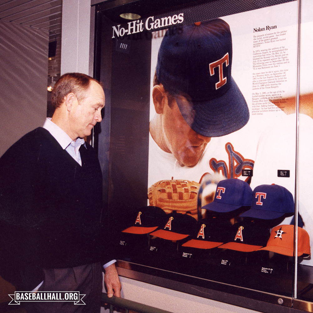 National Baseball Hall of Fame and Museum ⚾ on X: #TBT: Nolan Ryan admires  his seven no-hitter caps at the Hall of Fame in 2003. The exhibit looks a  little different these