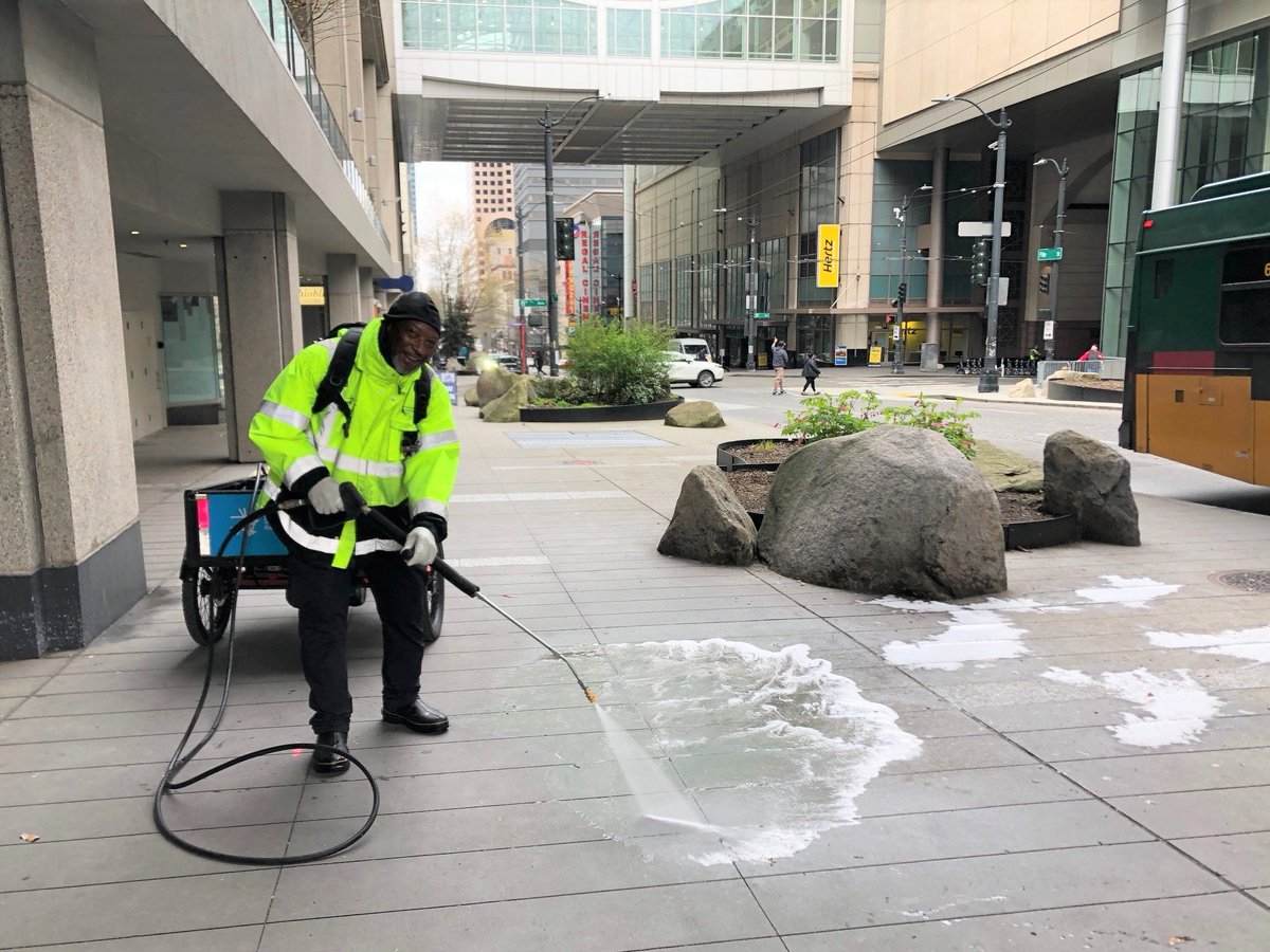 Thank you, hardworking Metropolitan Improvement District ambassador, for cleaning the sidewalks along Pike Street. We appreciate your efforts to keep our city beautiful. <a href="/downtownseattle/">Downtown Seattle</a>