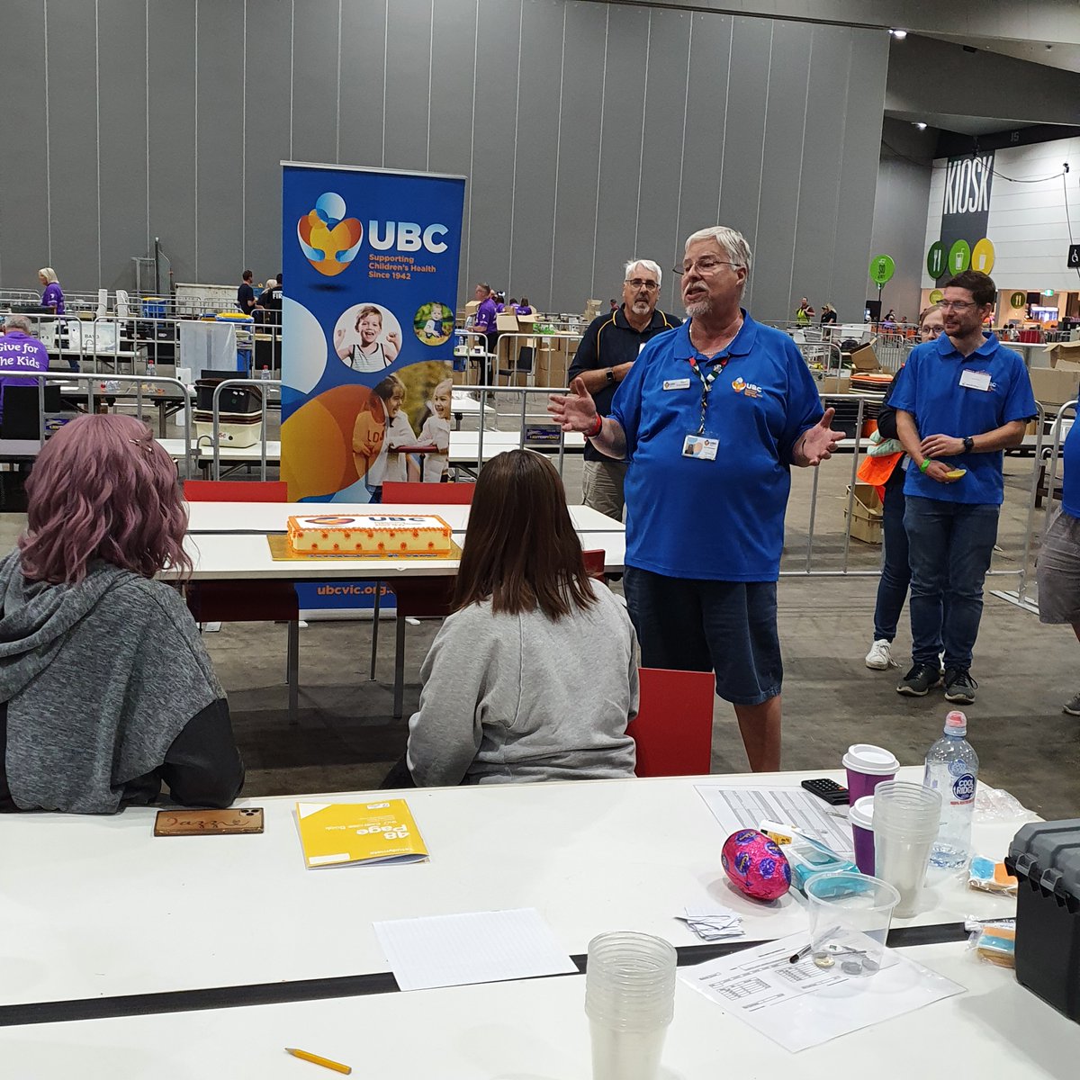 ubcvic's tweet photo. Tonight we celebrated UBC's 80th, State President Paul Etherington thanking all volunteers, whether it was their 1st time volunteering, or their 40th.
Shaun marked exactly 40 yrs of volunteering by cutting the cake made by Geri. @GoodFriAppeal 
#ubcvic #ubcgfa #ubcgfa22 #ubc80th https://t.co/MlrlYdz3lO