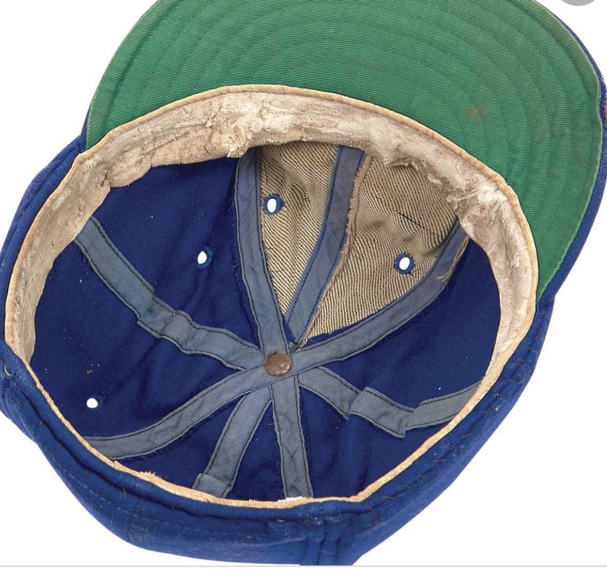 darrenrovell's tweet photo. Jackie Robinson’s hat had metal plates sewn inside his soft hat to protect his head in case things were thrown at him in the field. https://t.co/HdSW2EfTO2