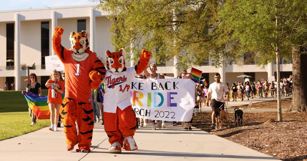 thetigerCU's tweet photo. Chants of “trans lives matter” and “gay lives matter” echoed throughout campus on Thursday evening during a “Take Back Pride” march, carried out in response to a controversial statements by Clemson College Republicans this week.  https://t.co/J8VwlxNTke https://t.co/Y9yBMR9xij