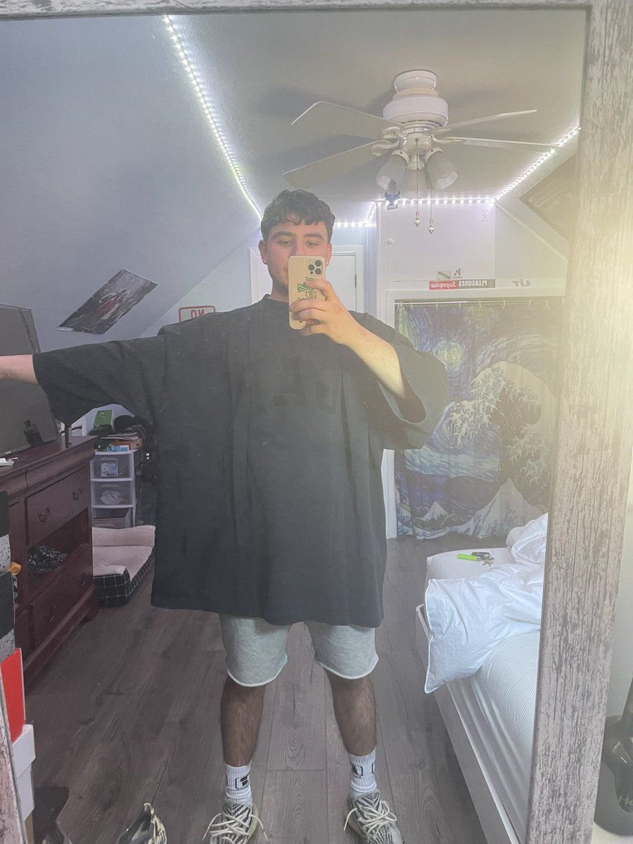 isaiahhandel's tweet photo. So this is the yeezy x gap tshirt size MEDIUM ive been waiting 2 months for. Yall said oversized but i didnt know u meant like this😭 So sick rn @kanyewest https://t.co/AOVxEsSic3