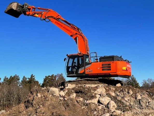 A Hitachi ZX350-7 working in Hjulsta, Stockholm, Sweden. Happy