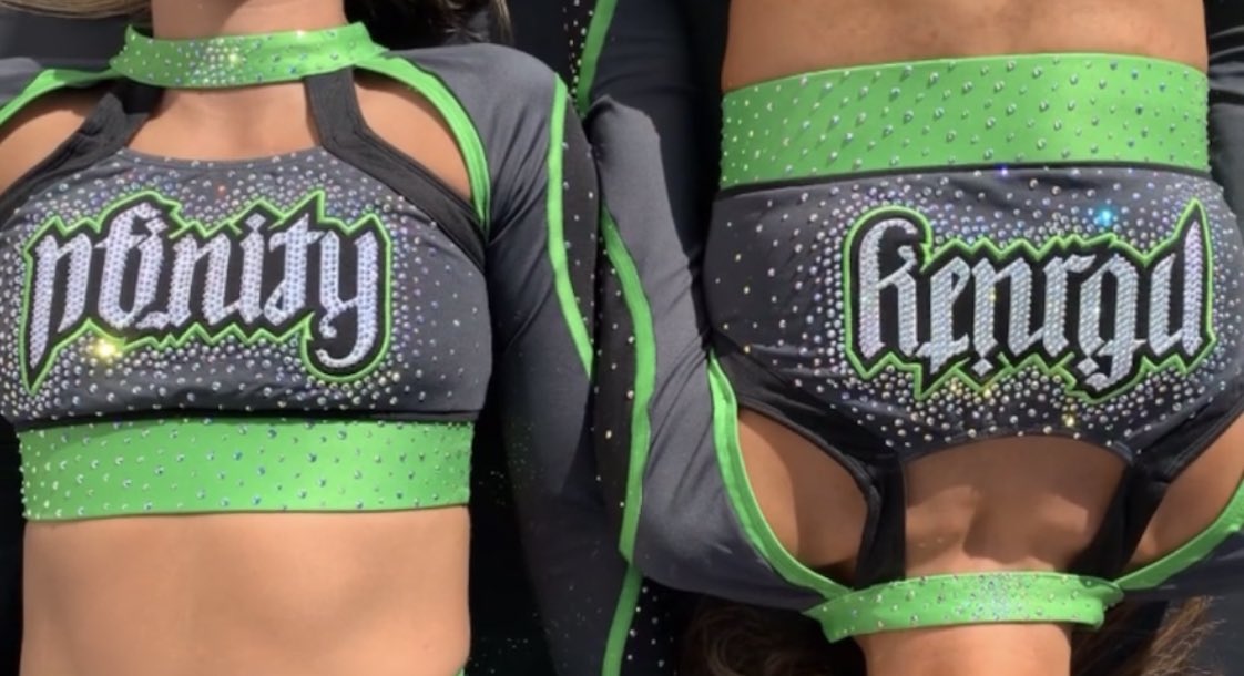 retiredcheerr's tweet photo. no bc i love nfinity’s new uni &amp; the sentiment of the font has me crying😭💚 (when you flip it upside down it says kenrod &amp; i am SOBBING) https://t.co/mDLhxjjfQz