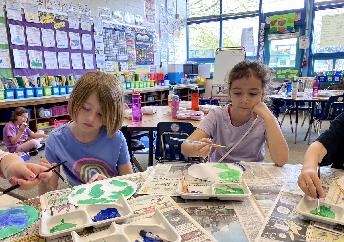 Creating our 🌎 art. 💙💚