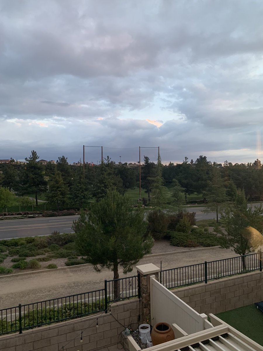 MagikMonta's tweet photo. The storm clouds are lingering but the sky is peeking though to say hello with just a hint of the sunset color I love so much. Happy Friday Friends #luckymonta #sunset https://t.co/0jg0sm5UbE