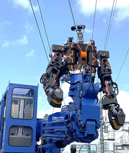blauereiter's tweet photo. OMG Labors are real !! This train cable repair bot deployed by JR East Japan is I quote "a heavy machinery puppet bot" manned by an operator with a VR headset. Headgear would be proud !! JR西日本、人型重機ロボットと工事用車両を融合させた鉄道重機開発 -  https://t.co/Vq4H6kSUuv https://t.co/Kvg515NPMY