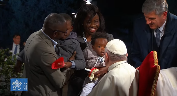 CatholicNewsSvc's tweet photo. Pope Francis greeting a family ahead of the Way of the Cross at the Colosseum. The meditations were written by families who carry difficult burdens in life, but find hope in faith, strength in their loved ones. https://t.co/iRmTWwrbg3