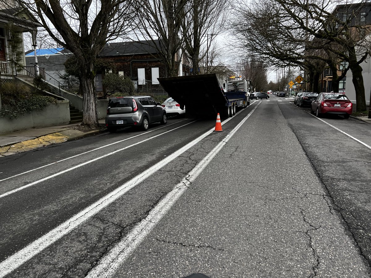 ClintRCulpepper's tweet photo. @joanbybike This is something that I tried to work very hard on with PBOT staff. I ran into a dead end because “someone else” works on loading zones. This should have been addressed when the street was reconfigured, not afterwards to fix the problems, right? Photos of recent examples. https://t.co/if6B7U4DSR