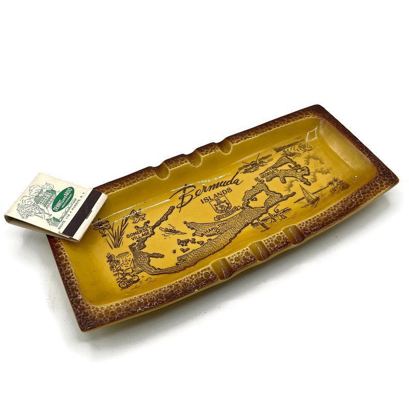 MerrilyVerilyVi's tweet photo. Excited to share this item from my #etsy shop: Vintage Ceramic Ashtray, Bermuda Islands Souvenir Ash Tray, Rectangular, Yellow, Bermuda Map and Landmarks, Vintage Tobacciana, Smoker Gift #vintageashtray #bermudaislands #smokergift #bermudasouvenir https://t.co/M9IQqBC42o https://t.co/tTxmlIwvTU