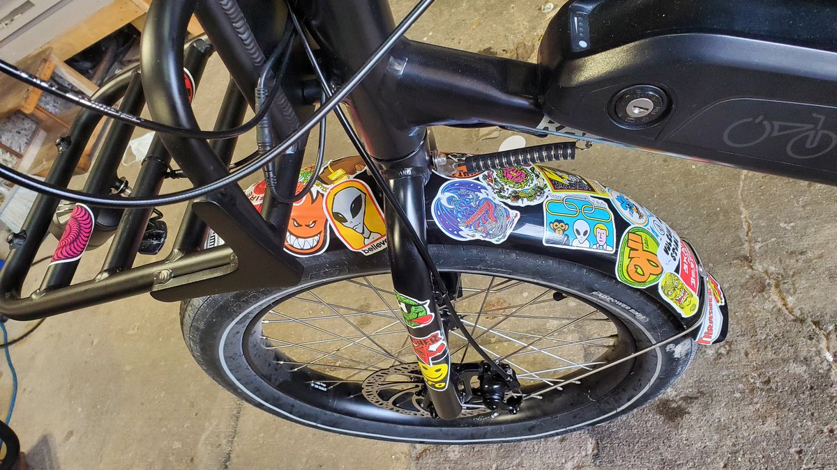 JohnKingBain's tweet photo. bought $15 worth of skate stickers and sat down with my daughter and tried to make the bike 1 part undesirable and 1 part highly identifiable.

it came out kind of nicely :)

#ottcycle #ottbike https://t.co/PtzgwPV5vJ