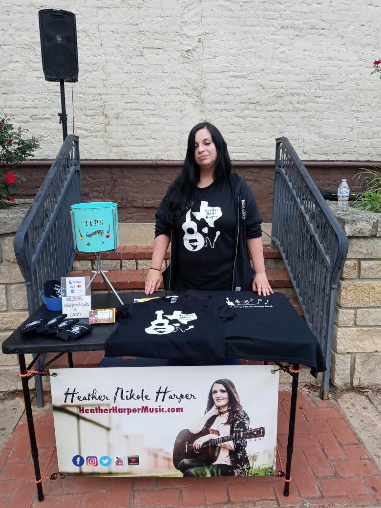 ArtsInMarshall's tweet photo. Pick up some #HeatherNikoleHarperBand merch at #ThirdSaturdayWeekend in #TelegraphPark in #MarshallTexas. #ArtsInMarshall #MarshallRegionalArtsCouncil #MRAC #TexasArts https://t.co/JKz49f5dLO https://t.co/QxqdqqQpoe