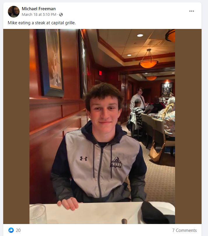 Another white boy at The Capital Grille wearing athletic attire.