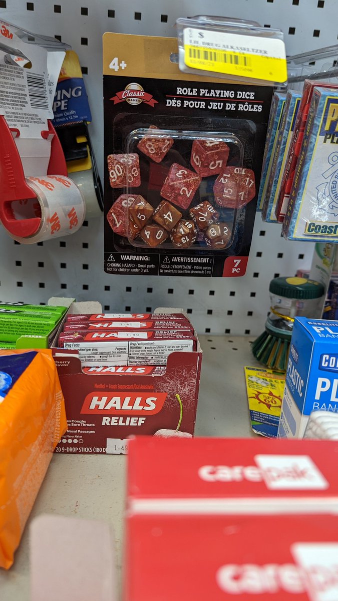 Popped into my local "Grab n Go", to get some toothpaste (you always forget something when traveling).  After wandering through the adult mags and fourties, my quarry was found.

But I noticed something strange.... What is this?