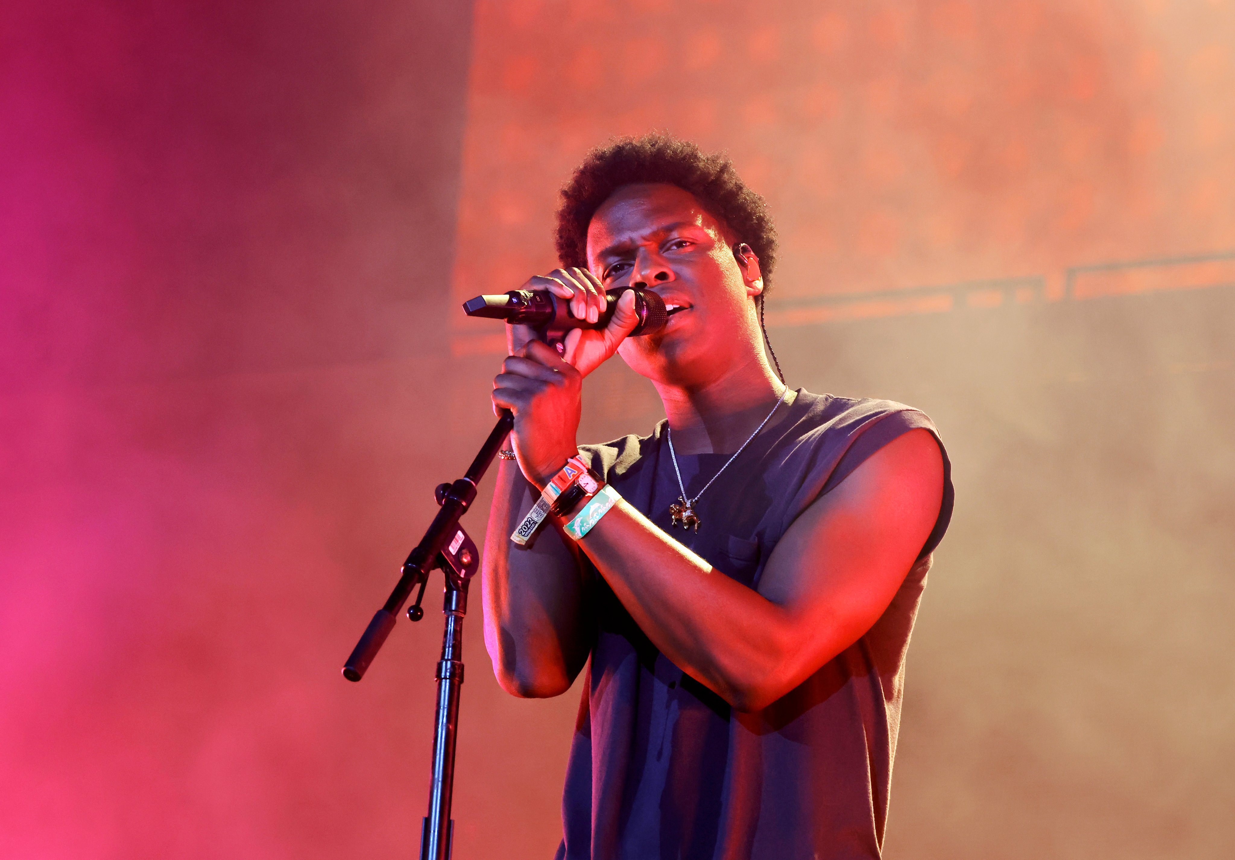 An aerial view of a field. A road runs through the upper right corner.