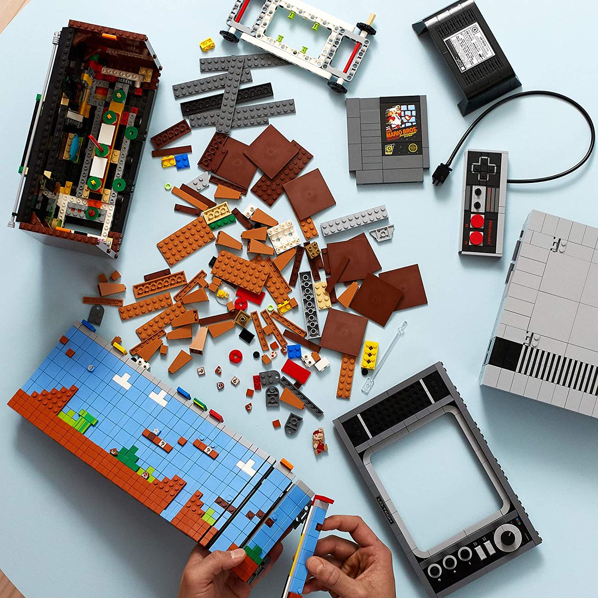 TechFindery's tweet image. Woah woah woah...definitely just ordered one of these for myself! Probably the coolest #Lego set I've EVER come across! An original #nintendo console that connect to a retro tv...AND THE SCREEN MOVES!

amzn.to/3OjCFXl

#SuperMario #SuperMarioWorld #LegoCollectible