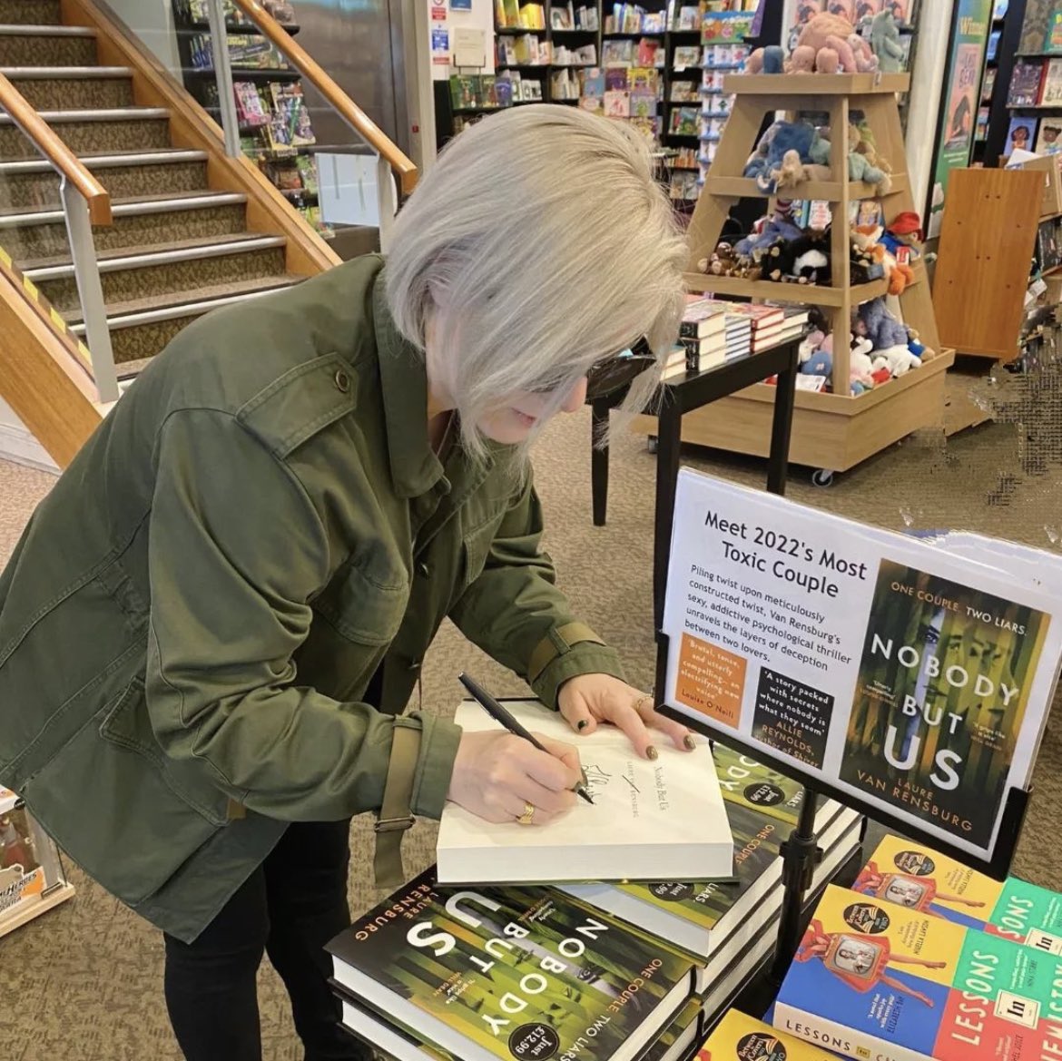 Laure0901's tweet photo. Just me signing copies of #NobodyButUs at my local Waterstones @RomfordBooks How great does that table look!? 💚🧡🖤 https://t.co/sTQnvHD9la