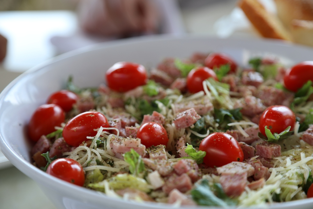 Lunch or dinner, our antipasto salad is delicious anytime! With house blend lettuce, Dearborn ham, aged salami, tomato, mozzarella, parmesan, oregano, &amp; red wine vinaigrette.