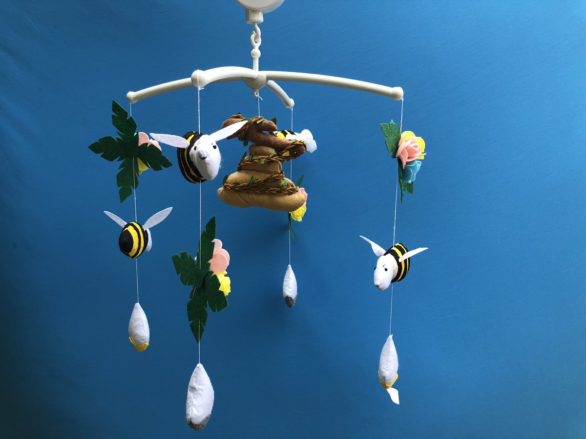 Bee family mobile for nursery. With music and hand-holder