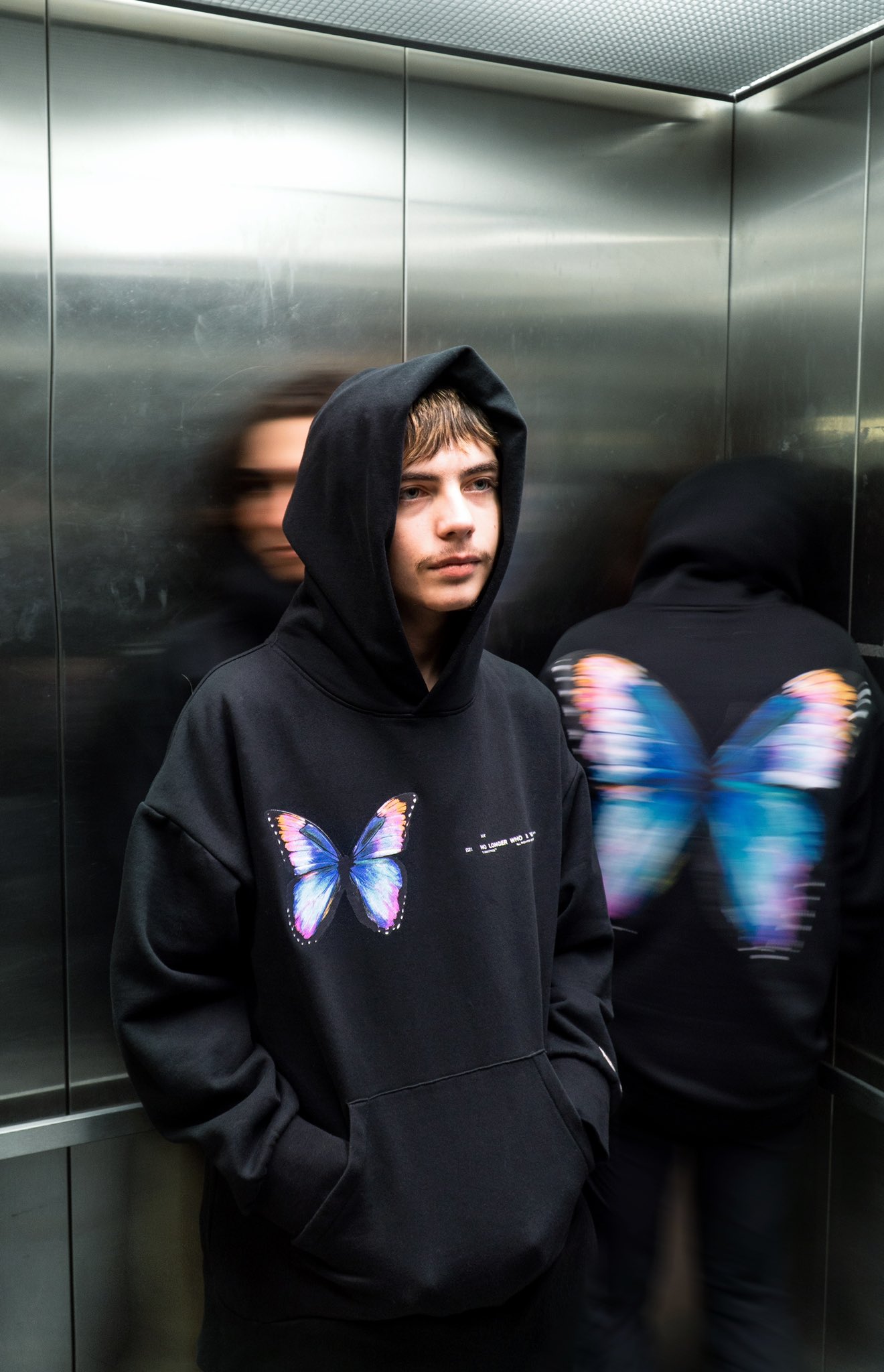 【MUCENT】 CHAIN BUTTERFLY HOOD T (UNISEX) /追跡付 CHAIN BUTTERFLY HOOD T UNISEX (2Color) | ファッション通販