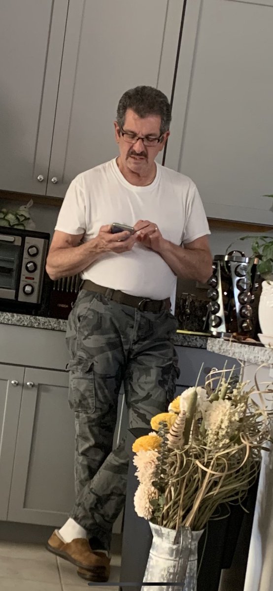 My handsome hubby. Something about a man in… slippers. 😂🤣😆