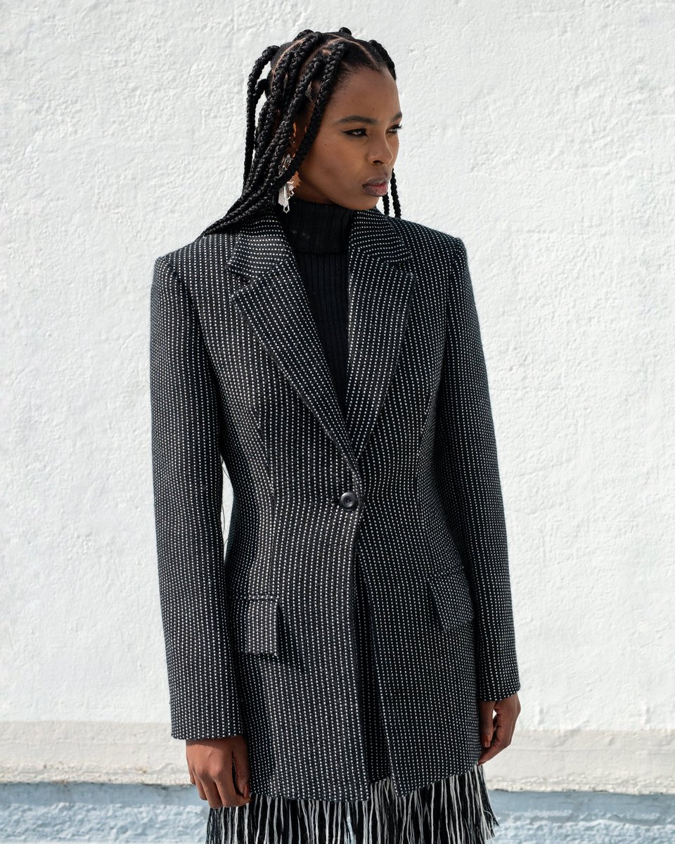 mmusomaxwell's tweet photo. UKHOLO - FAITH AW22’ 

Look 5 - Handwoven Merino Wool Gamp Tailored Jacket, Fringe mini skirt, Wool knitted turtleneck and Black  tailored pants 

PH - @tatendachidora 
Model - @iam_conniemore 
MU - @bassie_makeupartist https://t.co/j0ZiA6lH0c