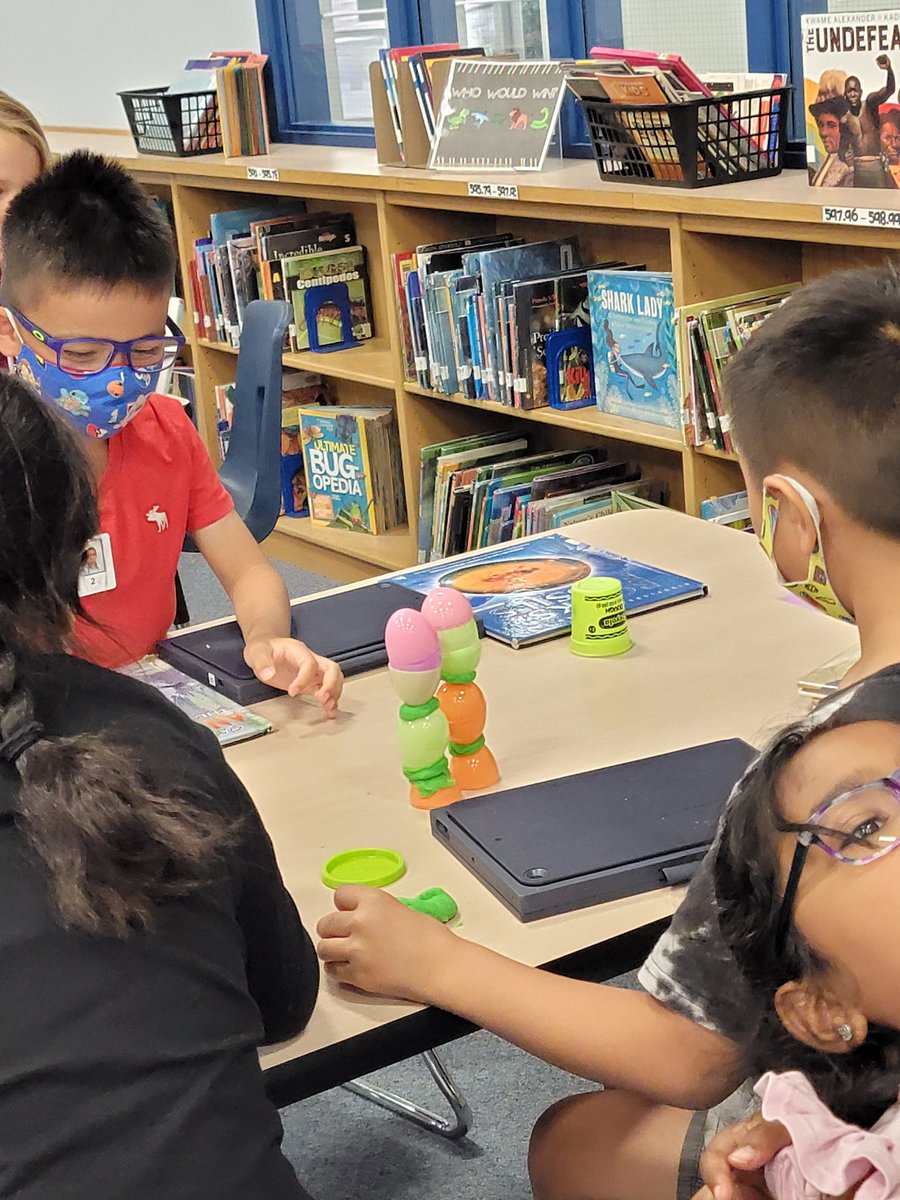 LAHarrisTX's tweet photo. Fun with eggs! Design an egg tower in 2nd grade, and BeeBot egg delivery carts in 3rd grade. #lisdlib https://t.co/viPRHg9T3r