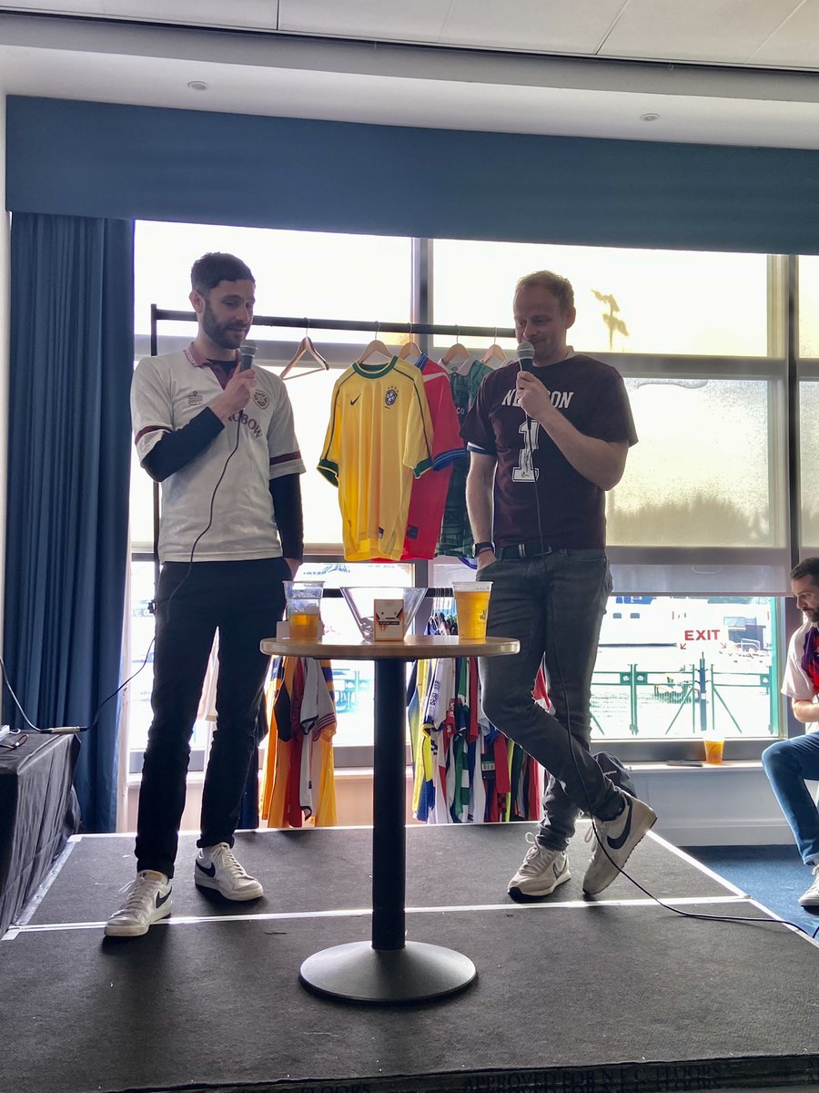 FootballKitCon's tweet photo. @RFBorthwick and @sked21 from @TheTerraceTV are answering questions from the audience. No one is talking about Joel wearing a Robbie Neilson tshirt back to front ๐ #FootballKitCon https://t.co/COouONG0aL