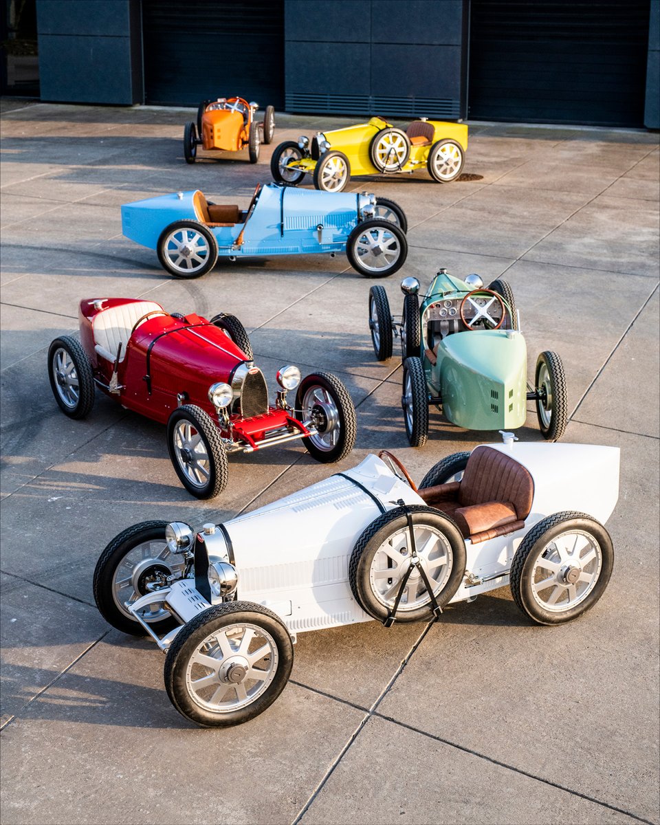 Bugatti's tweet photo. A fleet of six colorful new BUGATTI Baby IIs – crafted in partnership with @thelittlecar_co – were recently handed over to each of a BUGATTI’s long-standing customer’s six daughters at Molsheim. 

#BUGATTI #LitteCars #BabyBugattiII https://t.co/AOOIgMLimm