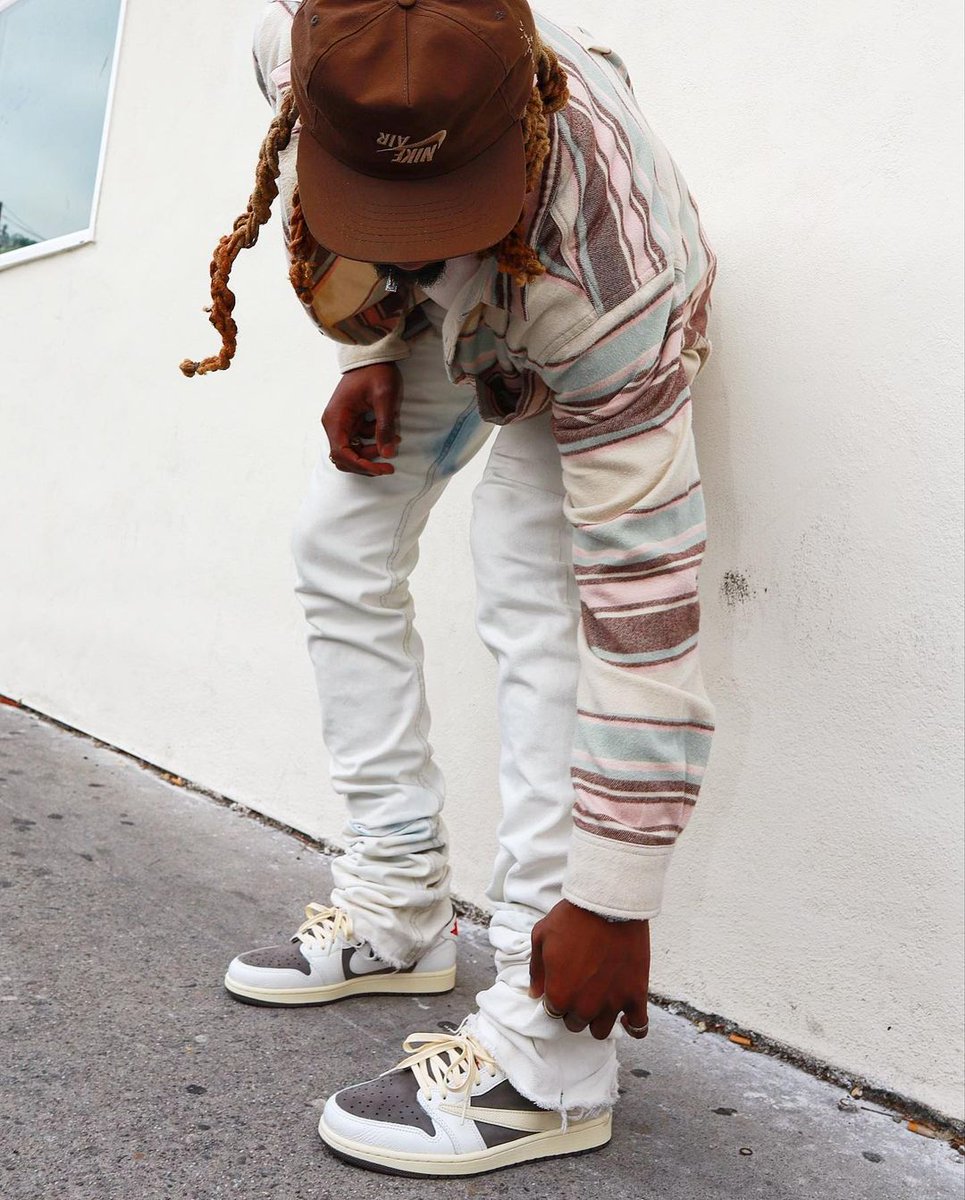 travis scott jordan 1 mocha on feet