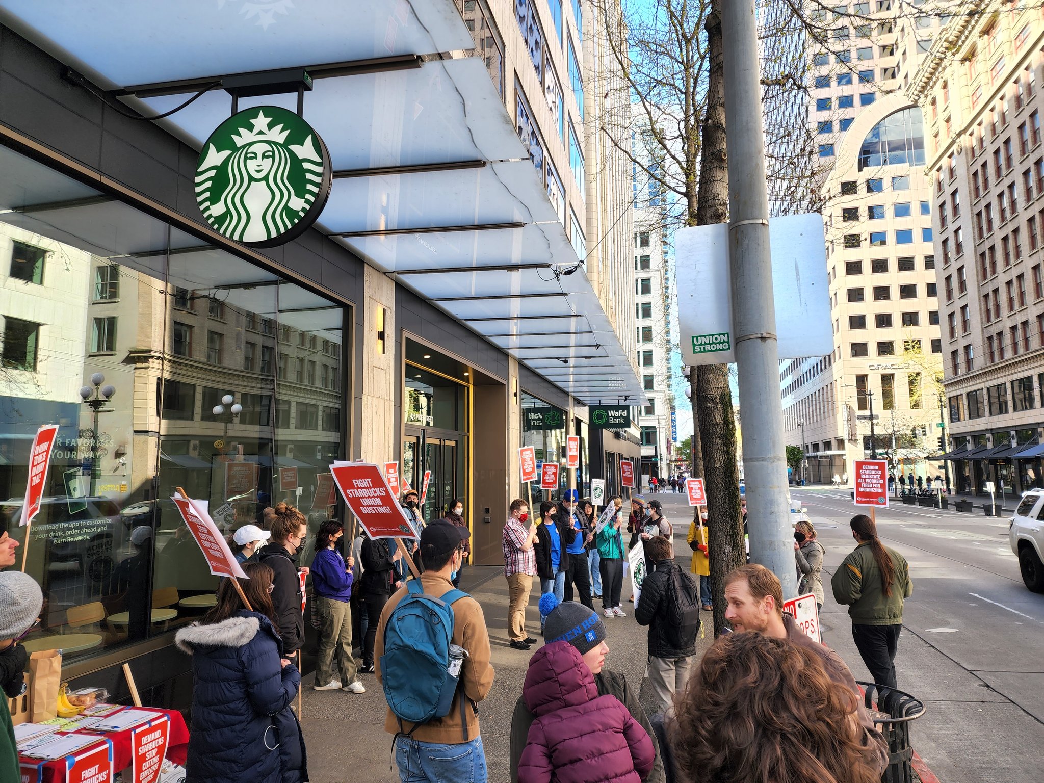 Workers and community supporters on strike at 5th and pike