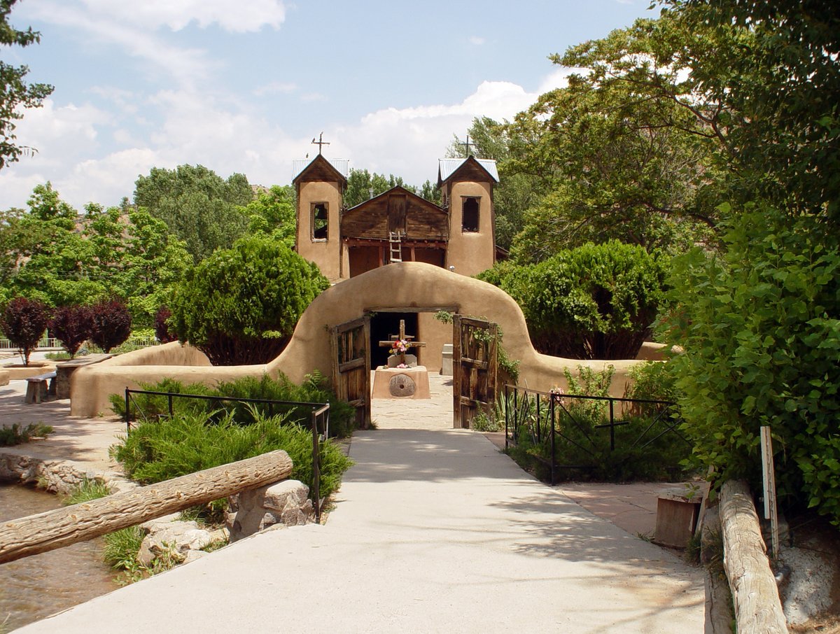 NewMexico's tweet photo. Every year, people travel to participate in the pilgrimage to El Santuario de Chimayo during Easter weekend. Nestled in the village of Chimayo, El Santuario de Chimayo is among the top pilgrimage destinations in the U.S. #NewMexicoTrue https://t.co/GfdjqhDm5L